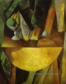 Pain et plat de fruits sur une table 1909 Cubisme